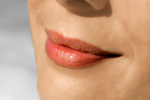 Sexy woman lips close-up of a beautiful young female model