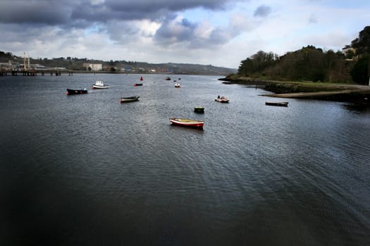 Small boats on river Lee, Cork, Ireland