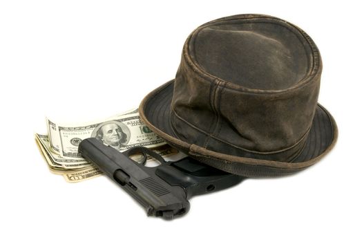 dollars and a gun and a hat on a white background