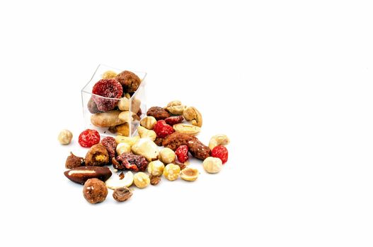 Mixed dried fruit sample on white background