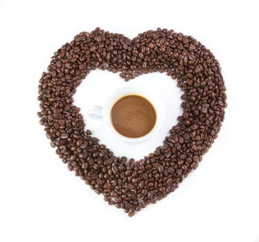heart from coffee beans isolated on white