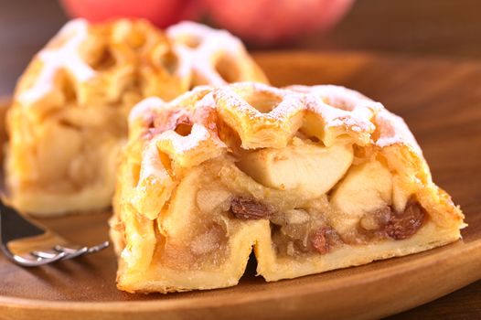 Apple strudel with raisins (Selective Focus, Focus on the left side of the apple-raisin stuffing)