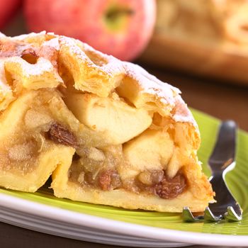 Apple strudel with raisins (Selective Focus, Focus on the raisin on the left side of the image)