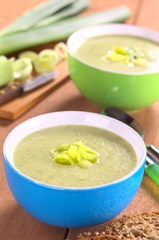 Fresh homemade leek soup (Selective Focus, Focus on the leek rings on the top of the soup)