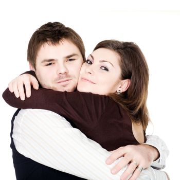 Stock photo: an image of a tight embrace of a young couple