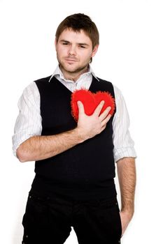 Stock photo: an image of a man pressing a red heart to his chest