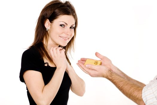 Stock photo: an image of surprised woman and man's hands with present