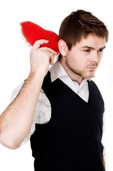 Stock photo: an image of a man with a red heart in his hand