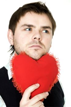 Stock photo: an image of a man with his chin on a red heart