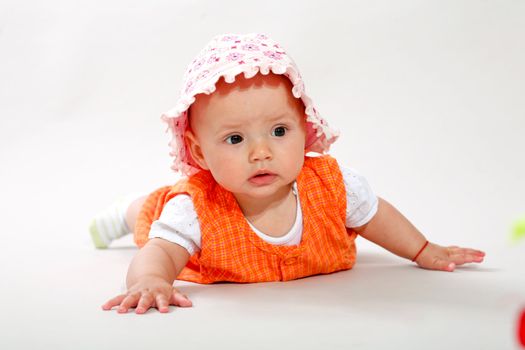 An image of cute baby in a studio