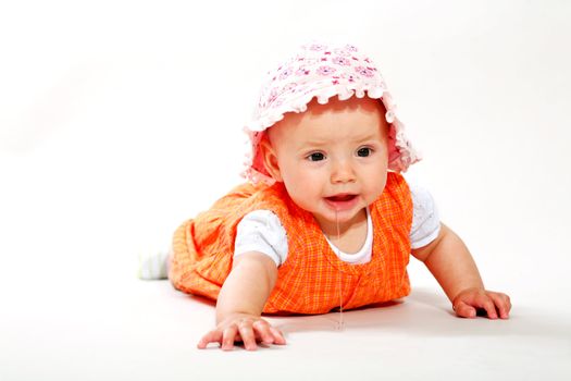 An image of cute baby in a studio