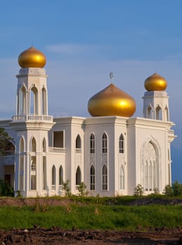 View of islamic mosque on sunset