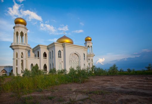 View of islamic mosque on sunset