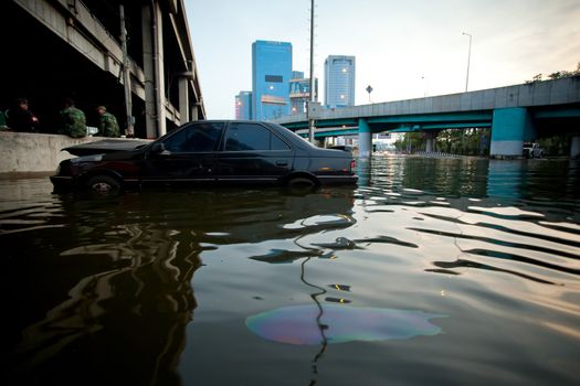 BANGKOK, THAILAND - NOVEMBER 5 : Car swamping in flood water during the worst flooding in decades on November 5,2011 Bangkok, Thailand.