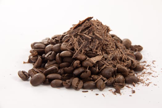 Picture of a bunch of coffee beans with a heap of chocolate cuttings