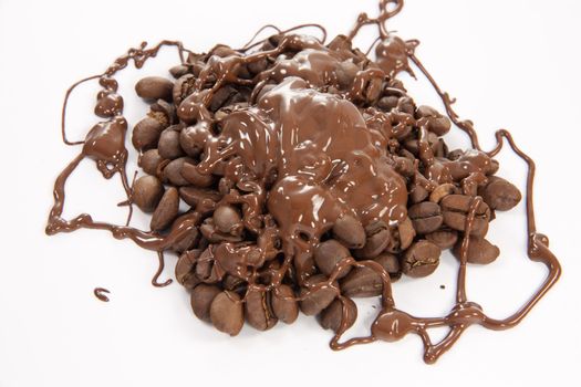 Coffee beans sprayed with melted chocolate