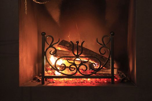 Fire with sparks in a beautiful fireplace