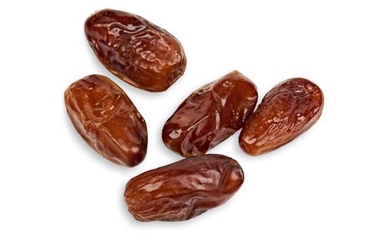 Dried dates isolated on white background with light shadow.