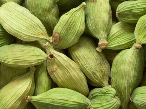 close up of cardamon pods food background