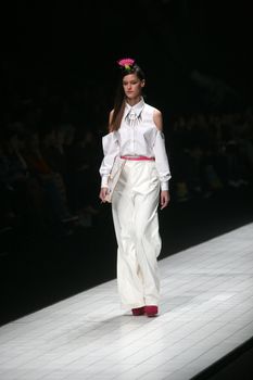 ZAGREB, CROATIA - MARCH 15: Fashion model wears clothes made by design group "Clash of 9" on "Dove FASHION.HR" show on March 15, 2012 in Zagreb, Croatia.