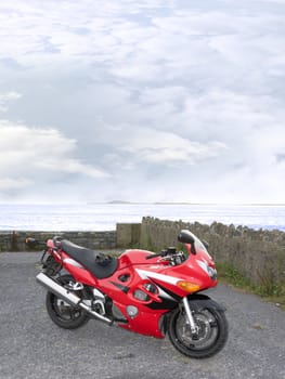 retro sports motorbike parked up in a scenic spot in ballybunion county kerry ireland