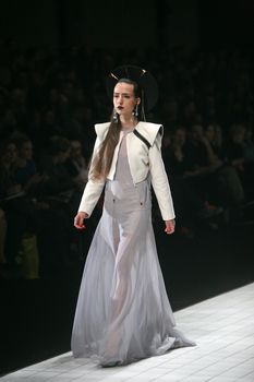 ZAGREB, CROATIA - MARCH 15: Fashion model wears clothes made by design group "Clash of 9" on "Dove FASHION.HR" show on March 15, 2012 in Zagreb, Croatia.