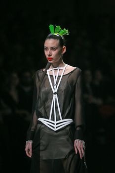 ZAGREB, CROATIA - MARCH 15: Fashion model wears clothes made by design group "Clash of 9" on "Dove FASHION.HR" show on March 15, 2012 in Zagreb, Croatia.