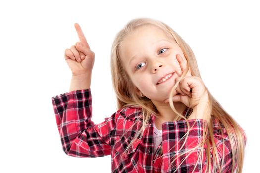 smiling little girl pointing at something, isolated on white