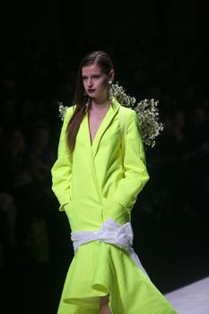 ZAGREB, CROATIA - MARCH 15: Fashion model wears clothes made by design group "Clash of 9" on "Dove FASHION.HR" show on March 15, 2012 in Zagreb, Croatia.