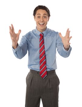 Excited male executive posing, isolated on white background