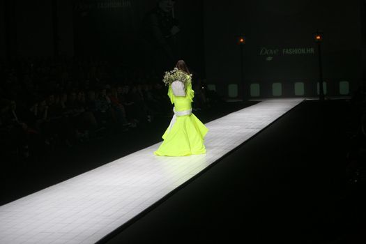 ZAGREB, CROATIA - MARCH 15: Fashion model wears clothes made by design group "Clash of 9" on "Dove FASHION.HR" show on March 15, 2012 in Zagreb, Croatia.