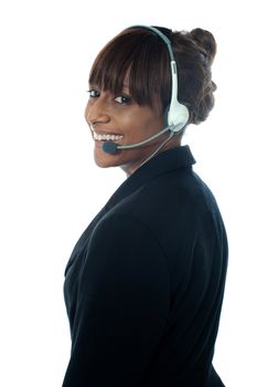 Portrait of executive female in headsets isoalted over white