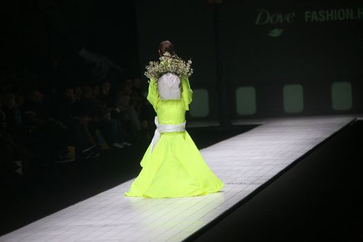 ZAGREB, CROATIA - MARCH 15: Fashion model wears clothes made by design group "Clash of 9" on "Dove FASHION.HR" show on March 15, 2012 in Zagreb, Croatia.