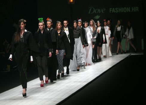 ZAGREB, CROATIA - MARCH 15: Fashion model wears clothes made by design group "Clash of 9" on "Dove FASHION.HR" show on March 15, 2012 in Zagreb, Croatia.