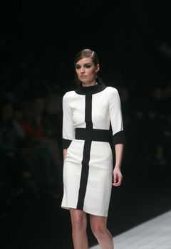 ZAGREB, CROATIA - MARCH 15: Fashion model wears clothes made by Aleksandar Zarevac on "Dove FASHION.HR" show on March 15, 2012 in Zagreb, Croatia.