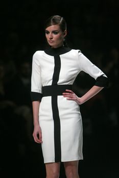 ZAGREB, CROATIA - MARCH 15: Fashion model wears clothes made by Aleksandar Zarevac on "Dove FASHION.HR" show on March 15, 2012 in Zagreb, Croatia.