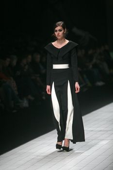 ZAGREB, CROATIA - MARCH 15: Fashion model wears clothes made by Aleksandar Zarevac on "Dove FASHION.HR" show on March 15, 2012 in Zagreb, Croatia.