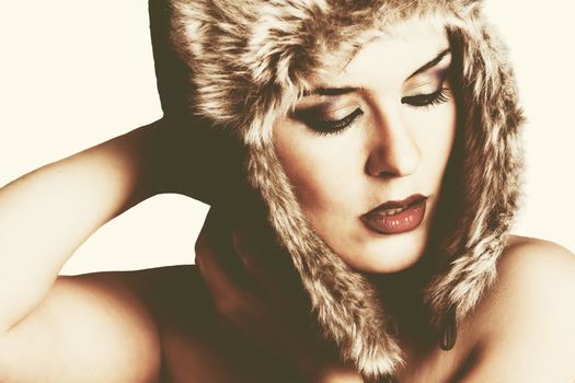 Sexy winter woman with snow hat, vintage style