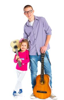 Cute boy and his sister with classical guitars. Isolated on white background