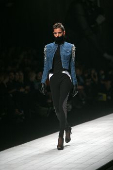 ZAGREB, CROATIA - MARCH 15: Fashion model wears clothes made by AMDS by Alduk on "Dove FASHION.HR" show on March 15, 2012 in Zagreb, Croatia.