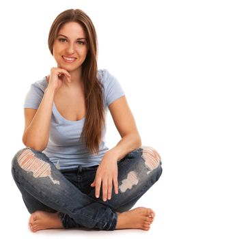 Young happy caucasian woman sitting isolated over white background