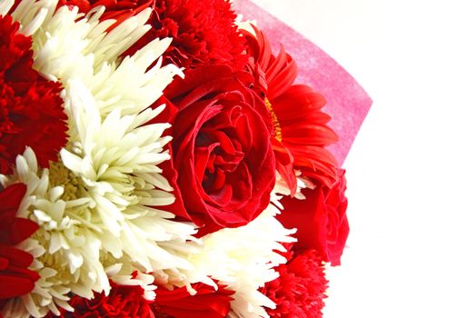 Red and white floral bouquet on white background