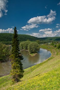 Beautiful summer landscape with river, mountain and sky