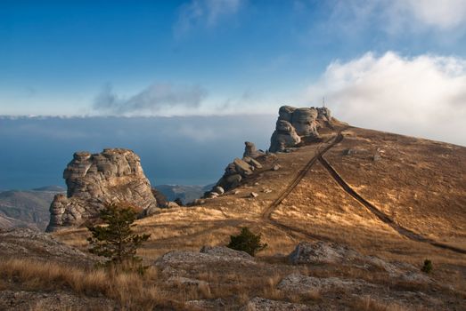 Rocks in mountains among clouds, Crimea, Southern Demerdzhi