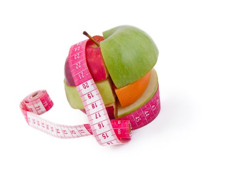 Fruit mix with tape measure, isolated on white