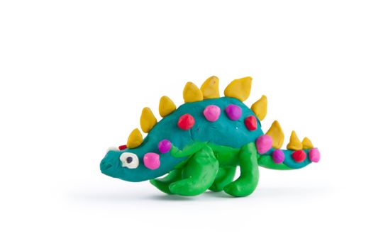 Dinosaur made of plasticine isolated on white