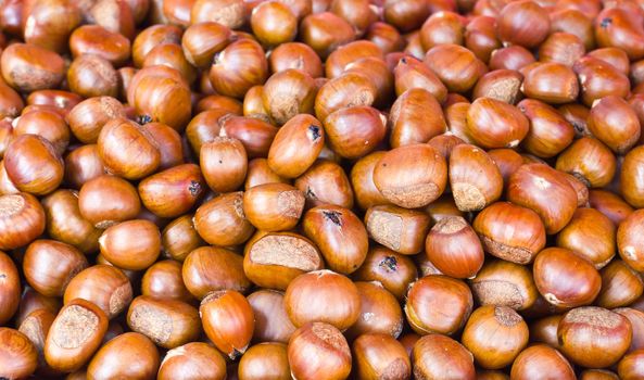 Pile of chestnuts for sale in market