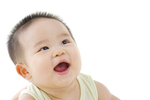 Happy pan Asian baby looking up and smiling