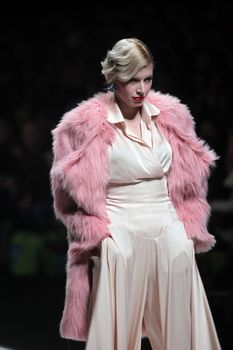 ZAGREB, CROATIA - MARCH 16: Fashion model wears clothes made by Aleksandra Dojcinovic on "Dove FASHION.HR" show on March 16, 2012 in Zagreb, Croatia.