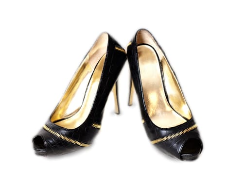 Pair of black high heel shoes, isolated towards white